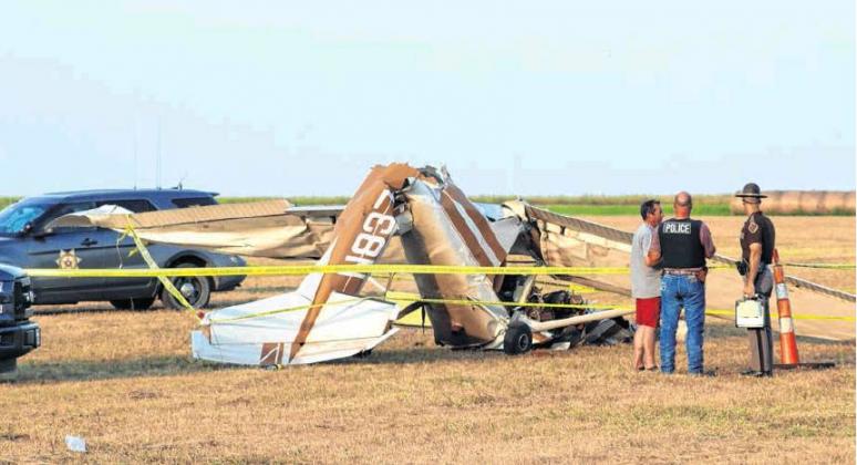 Cordell first responders look over the wreckage from a plane crash at the Cordell Airport in August 2019. Bob Henline | The Cordell Beacon