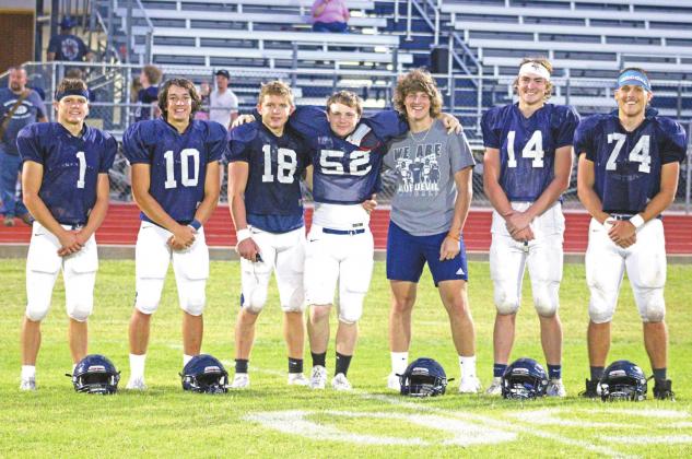 In this file photo, Cordell seniors, from left, Dane Corbin, Raydon Kuehne, Adden Zanghi, Devon Christian, Cameron Cochran, Bode Gallagher and Gavin Jasmer pose for a picture on the night Christian suffered a knee injury. Corbin, Kuehne, Zanghi and Gallager received top All-District honors for season. BEACON FILE PHOTO