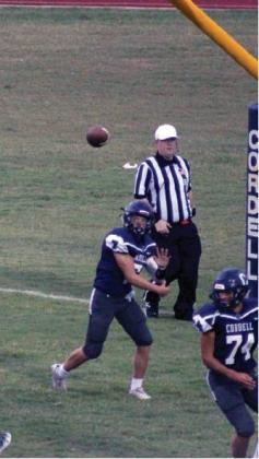 Below left: Raydon Kuehne brings down the Thomas running back.