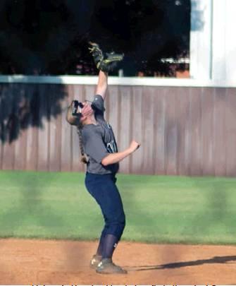 Makenzie Hougland hauls in a fly ball against Sayre. Bob Henline | The Cordell Beacon