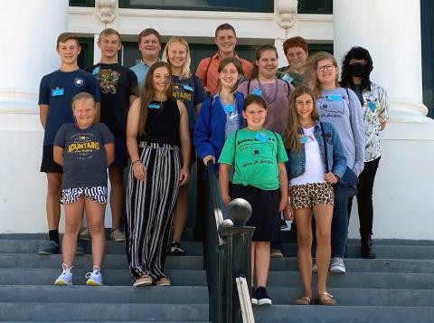 Washita County 4-H members stand in front of the courthouse during their visit for a day of learning about different types of situations where they can apply this real life experience. CONTRIBUTED PHOTOS