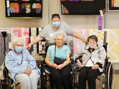 L-R Jewell Pankhurts, Bertha Krehbiel and Clara Horn pose with a caretaker at Corn Heritage Village. CONTRIBUTED PHOTO