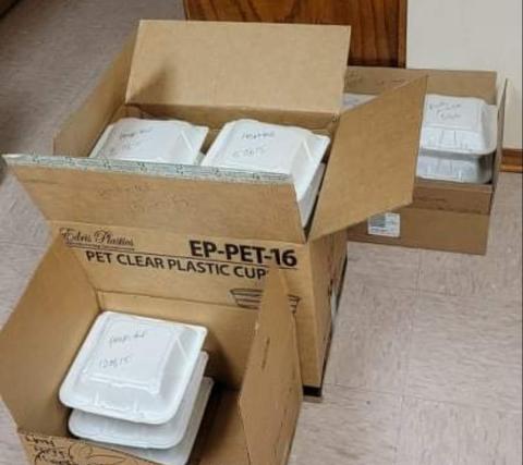 To-Go Meals are packed and ready to deliver at the Community Thanksgiving held at the 4th and College Church of Christ. CONTRIBUTED PHOTO