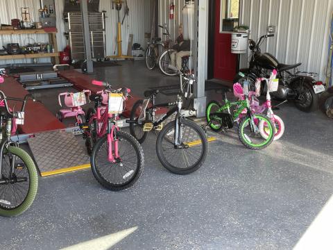 Donated bicycles are lined up shiny and ready to be delivered to area children this Christmas. PHOTOS BY BROOKLYNN PEEK
