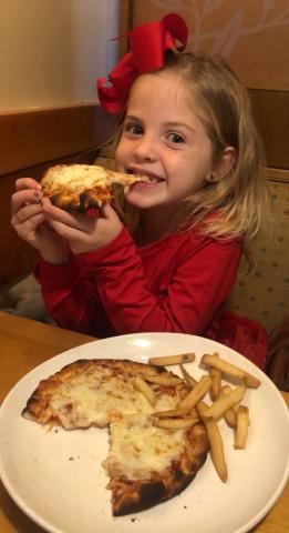 Sloane Roberts enjoys pizza! 