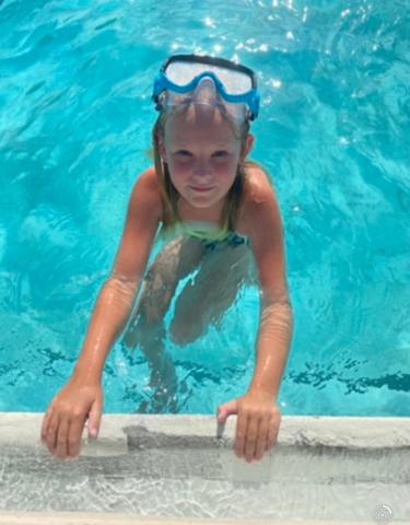 Journee Cooper enjoys a fun day at the pool! Photo by Stephanie Brown