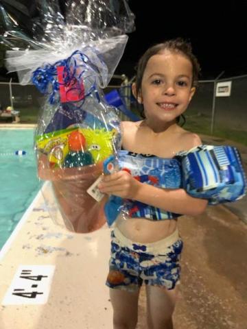 Jace Kelly is all smiles with his prize basket