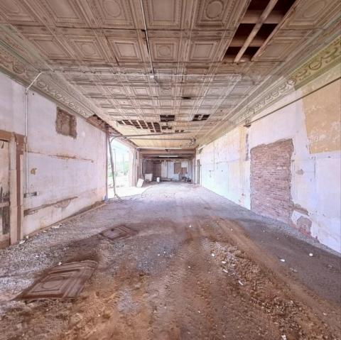 The building being demolished to make way for the new Bessie Fire Station has a long history and is full of interesting finds, such as these antique ceiling tiles that are going to be for sale as a fundraiser for the Fire Department.