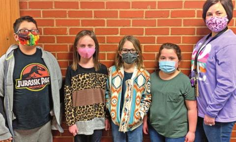 Cordell second-graders from left: Saxon Flores, Addelin Meget, Kimber Feltman and Cambree Moorex, stand with teacher Blaire Wall.