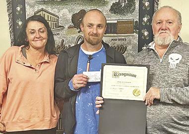 Valerie and Jeremy Boyd accept their award from Mayor David Jones