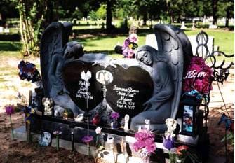 Tamera Moore’s headstone is perched on a small hill in the Wheelock Cemetery in Millerton, just east of Vallian, where Moore was found dead in her home on Sept. 4, 2017. Whitney Bryen | Oklahoma Watch