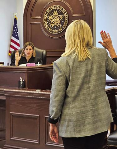Honorable Judge Brooke Gatlin swears in new CASA (Court Appointed Special Advocate) Volunteer Laurie Crall of Weatherford. Laurie saw the many needs of children as a teacher in the Weatherford School System and wanted to advocate for them and be a part of changing their stories. CONTRIBUTED PHOTO