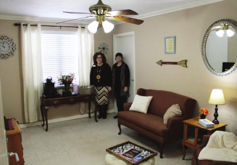 Gail Wilcox, left, and Victoria Snider in the new family comfort room at Cordell Christian Home. Bob Henline | The Cordell Beacon