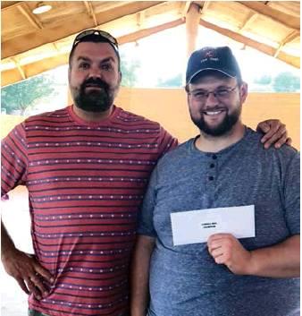BBQ Cordell organizer Mike Reimer, left, with Cordell’s first-ever sliced brisket champion David Miller. Photo courtesy of Amanda Reimer.