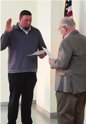 City attorney Johnny Beech administers the oath of office to Lowell “Buddy” Holman, Cordell’s newest city councilman. Photo courtesy of Nancy Moser.