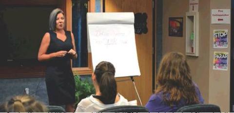 Carolyn Heerwald, White Arrow, talking with WTC female students about Characteristics of Successful Women during the annual Workforce Readiness Conference. Photo courtesy of Sarah Hirschman.