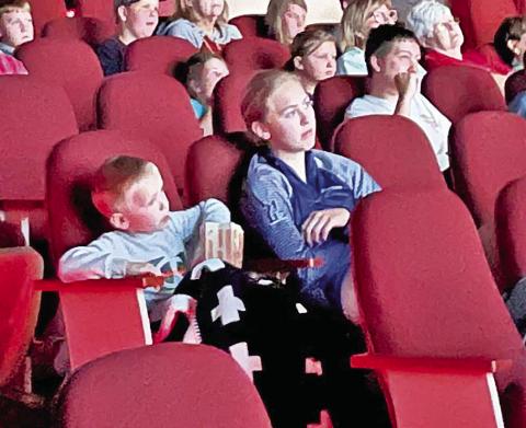 Theater patrons enjoy the Monday afternoon movie