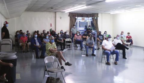 Residents Pack Room To Defend EMS