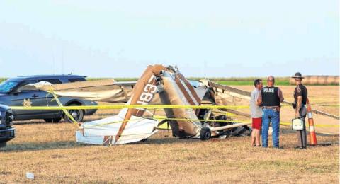 Cordell first responders look over the wreckage from a plane crash at the Cordell Airport in August 2019. Bob Henline | The Cordell Beacon