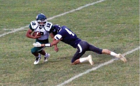 Above: Cordell’s Carsen Nickel penetrates the backfield for a big sack against Thomas. Bob Henline | The Cordell Beacon